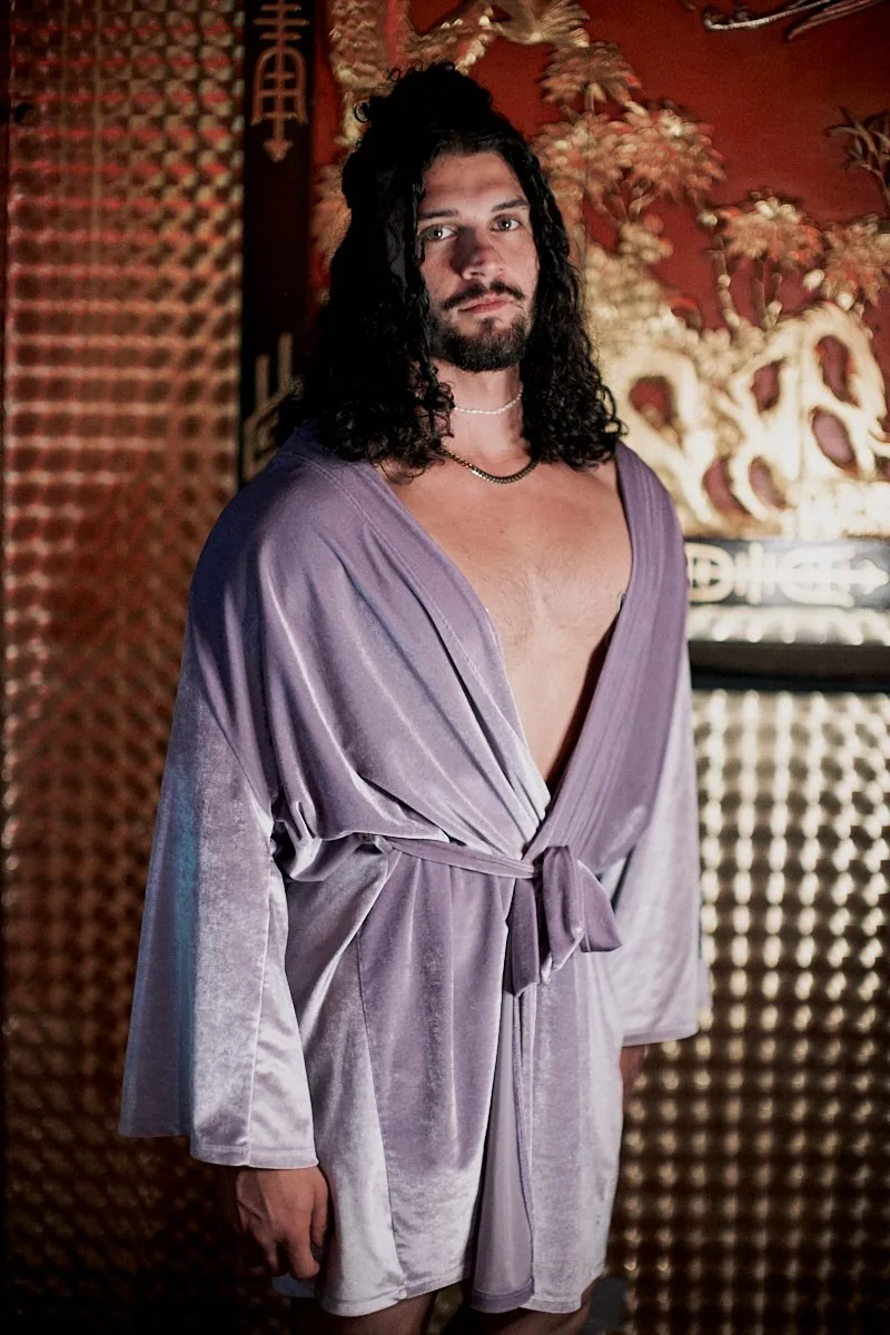Miguel in lavender robe
